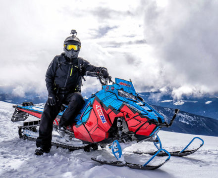 Snowmobile parked on a mountain